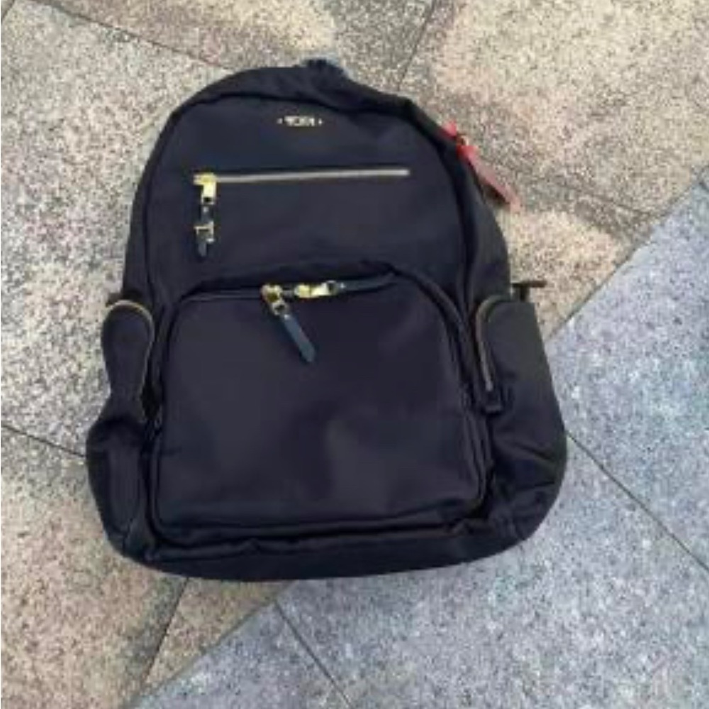 Tumi Black Backpack with Durable Design and Practical Features